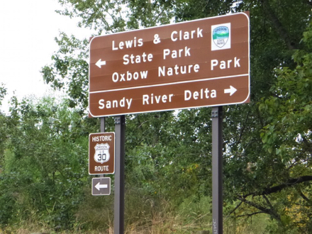 Street sign directing to Historic Route 30, Oxbow Park and Sandy River Delta